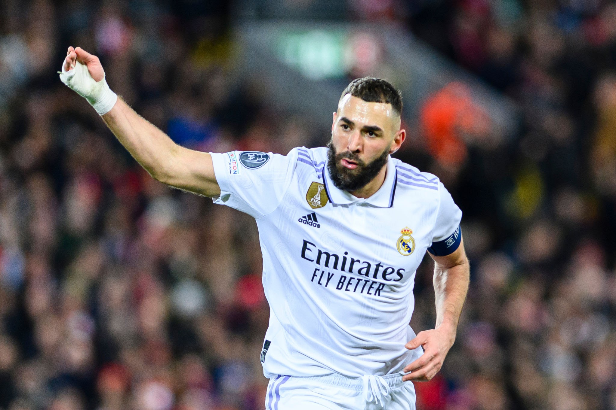 LIVERPOOL, ENGLAND - FEBRUARY 21: Karim Benzema of Real Madrid celebrates his goal during the UEFA Champions League round of 16 leg one match between Liverpool FC and Real Madrid at Anfield on February 21, 2023 in Liverpool, United Kingdom. (Photo by Richard Callis/Eurasia Sport Images/Getty Images)